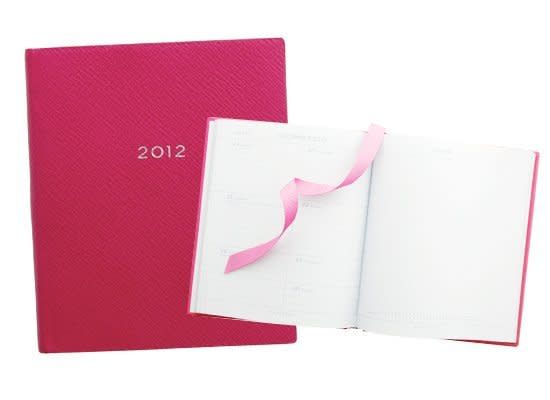 <a href="http://www.smythson.com/us/diaries/for-her/mid-size-diaries/bijou-soho-diary-in-fuchsia.html" target="_hplink">Smythson</a>