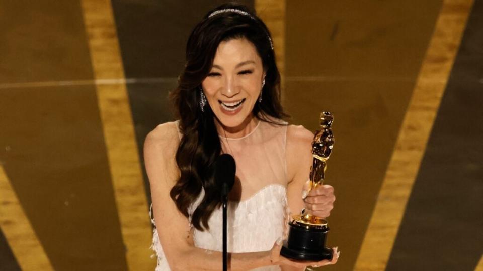 Michelle Yeoh accepting her Best Actress Oscar (Getty Images)