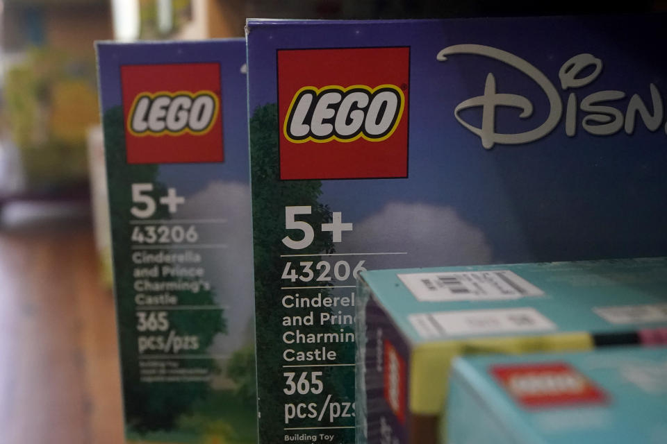 Lego toys are shown on a shelf at a Five Little Monkeys store in Berkeley, Calif., Monday, Dec. 12, 2022. Small retailers say this year looks much different than the last "normal" pre-pandemic holiday shopping season of 2019. They're facing decades-high inflation forcing them to raise prices and making shoppers rein in the freewheeling spending seen in 2021 when they were flush with pandemic aid and eager to spend. (AP Photo/Jeff Chiu)