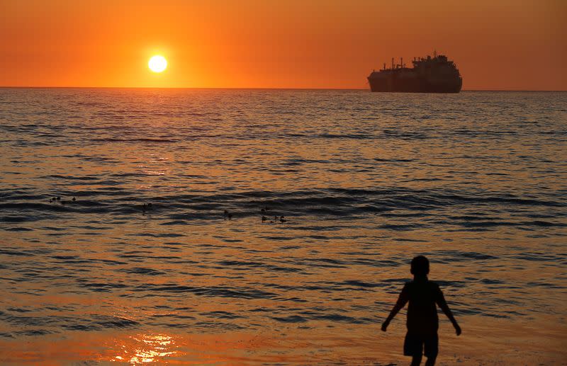 A cargo ship is seen at the coast of Vina del Mar