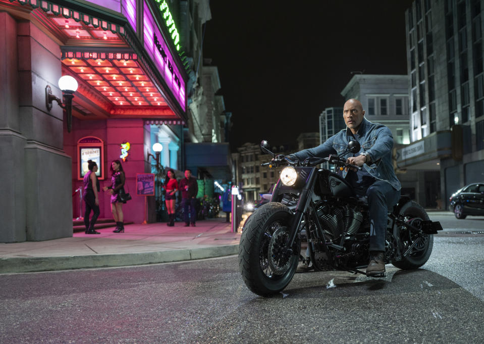 This image released by Universal Pictures shows Dwayne Johnson in a scene from "Fast & Furious Presents: Hobbs & Shaw." (Frank Masi/Universal Pictures via AP)