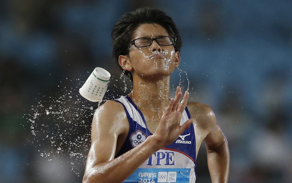 Taiwan's Chang Wei-Lin competes during the men's 10,000m race walk at the 2014 Nanjing Youth Olympic Games in Nanjing, Jiangsu province, in this August 24, 2014 file photo. REUTERS/Aly Song/Files (CHINA - Tags: SPORT OLYMPICS ATHLETICS TPX IMAGES OF THE DAY)