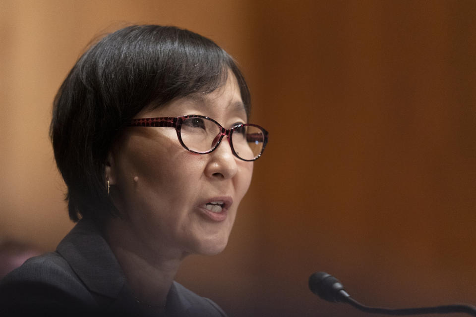 Saule Omarova of New York testifies before a Senate Banking, Housing, and Urban Affairs hearing on Capitol Hill in Washington to examine her nomination to be the Comptroller of the Currency, Thursday, Nov. 18, 2021. (AP Photo/Manuel Balce Ceneta)