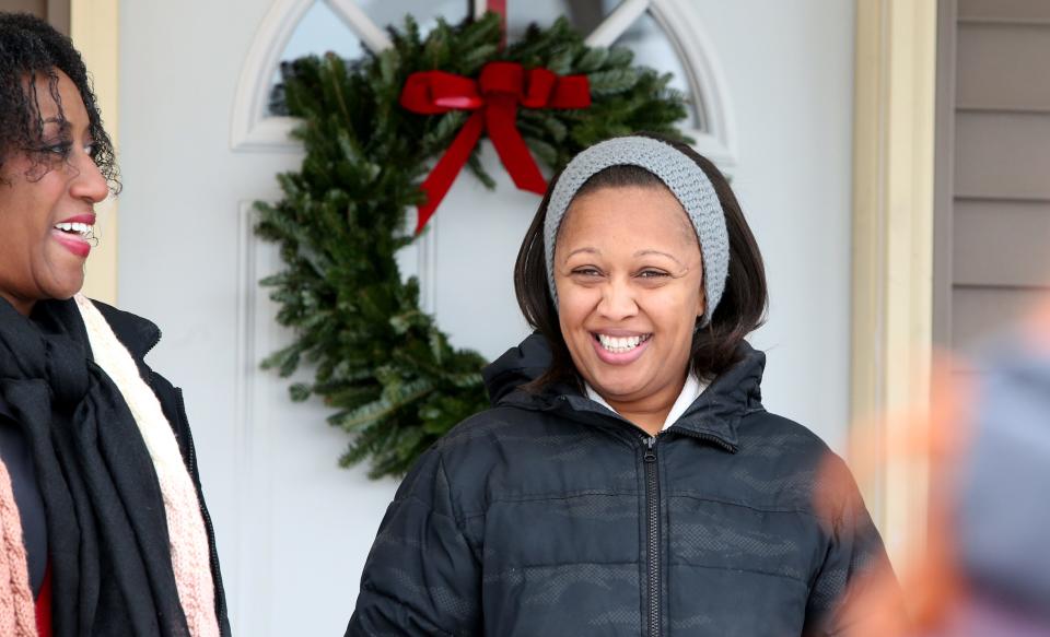 A ceremony for the latest new homeowner to move into a house built by Habitat for Humanity of St. Joseph County takes place Wednesday, Dec. 20, 2023, on Yearwood Lane in Mishawaka. Ryan Durham received the keys to her new house, one of 12 that were built in 2023, according to Habitat officials.