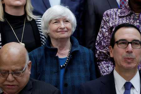 FILE PHOTO: Federal Reserve Chair Janet Yellen poses for IMF Governors family photo during the IMF/World Bank annual meetings in Washington, DC, U.S., October 14, 2017. REUTERS/Yuri Gripas/File Photo