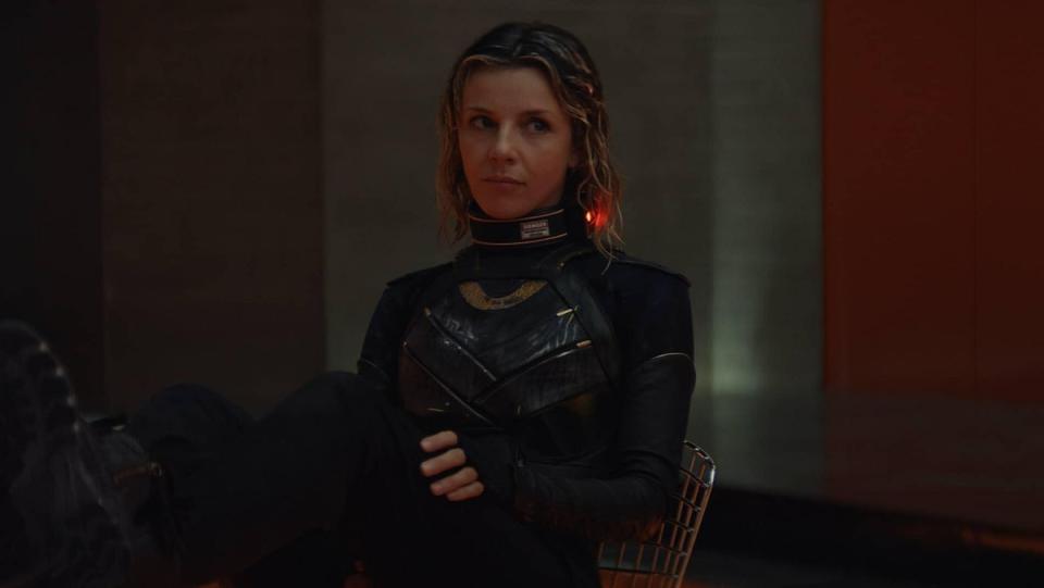 Sylvie (Sophia Di Martino), wearing a power-inhibiting collar, sits in a holding cell in Loki episode 4.