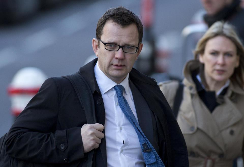 FILE - This is a Friday, Feb. 21, 2014 file photo of Andy Coulson, former News of the World editor and former aide to British Prime Minister David Cameron arrives at the Central Criminal Court in London. Coulson said his affair with fellow executive Rebekah Brooks was wrong, but didn't lead him to break editorial standards. Coulson told jurors at London’s Central Criminal Court Monday April 14, 2014 that the on-off affair, which began in 1998, "was wrong and it shouldn't have happened."(AP Photo/Alastair Grant, File)