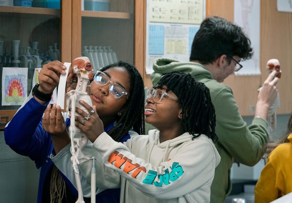 Anastashea Benjamin and Ariana Roundtree participate in the Academy of Scientific Inquiry and Medicine CTE program at Mainland High School, Tuesday, Feb. 14, 2022.