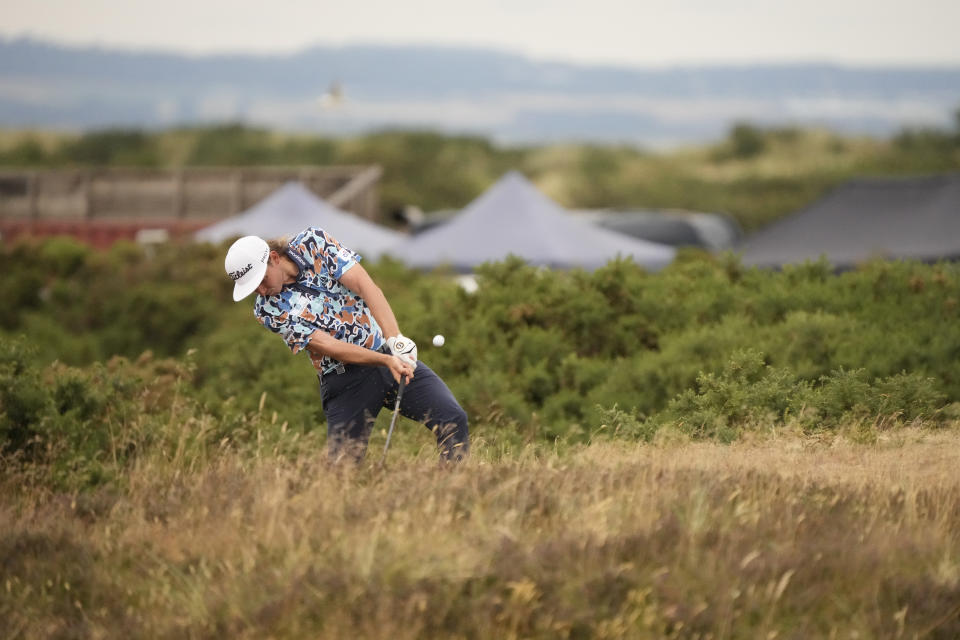 Cameron Smith, of Australia, plays out of the rough during the third round of the British Open golf championship on the Old Course at St. Andrews, Scotland, Saturday July 16, 2022. (AP Photo/Gerald Herbert)