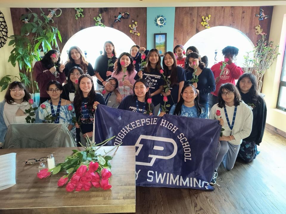 The Poughkeepsie girls swimming team was presented congratulatory flowers during a ceremony last Saturday after winning their first Section 1 conference title since 1994.