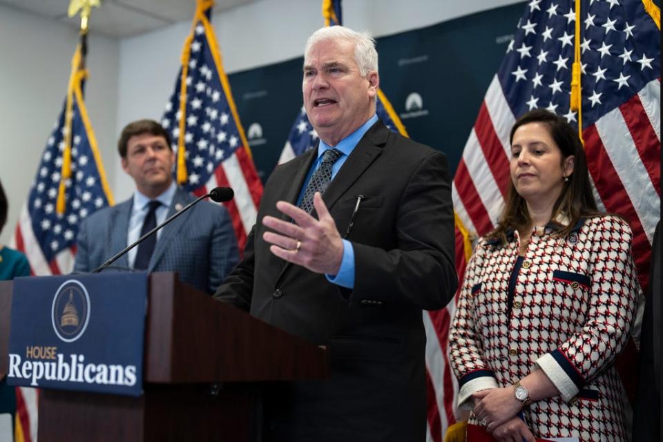 House Majority Whip Tom Emmer, R-Minn., center, flanked by House Budget Committee Chairman Jodey Arrington, R-Texas, left, and House Republican Conference Chair Elise Stefanik, R-N.Y., speaks to reporters following a closed-door meeting with fellow Republicans at the Capitol in Washington, Wednesday, April 26, 2023.