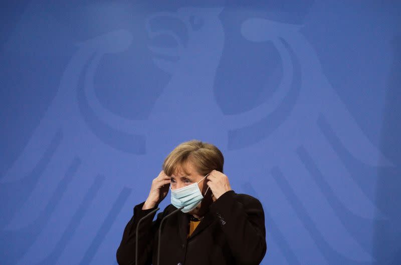 FILE PHOTO: German Chancellor Angela Merkel briefs the media after a virtual meeting with federal state governors at the chancellery in Berlin