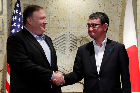 U.S. Secretary of State Mike Pompeo (L) shakes hands with Japan's Foreign Minister Taro Kono prior to their breakfast meeting in Tokyo, Japan, July 8, 2018. REUTERS/Kim Kyung-Hoon/Pool