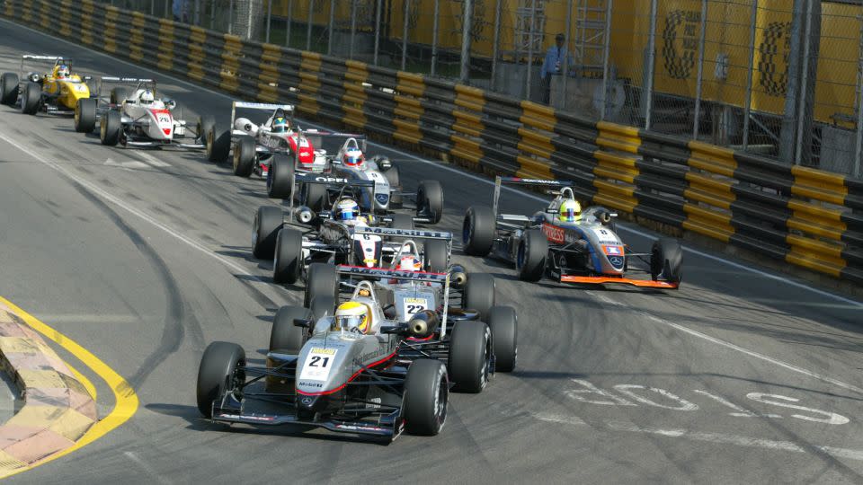 Aged 19, Hamilton leads the Macau Grand Prix while racing in Formula 3 in 2004. - Antony Dickson/South China Morning Post/Getty Images