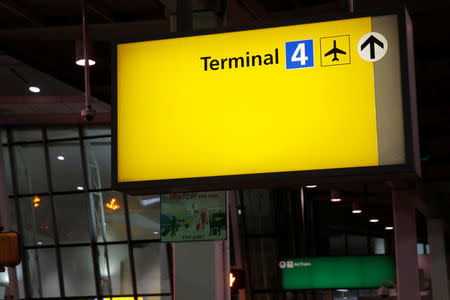 Signage is seen in the arrivals area of Terminal 4 at John F. Kennedy International Airport following a water main break that closed a section of the terminal in New York City, U.S. January 7, 2018. REUTERS/Andrew Kelly