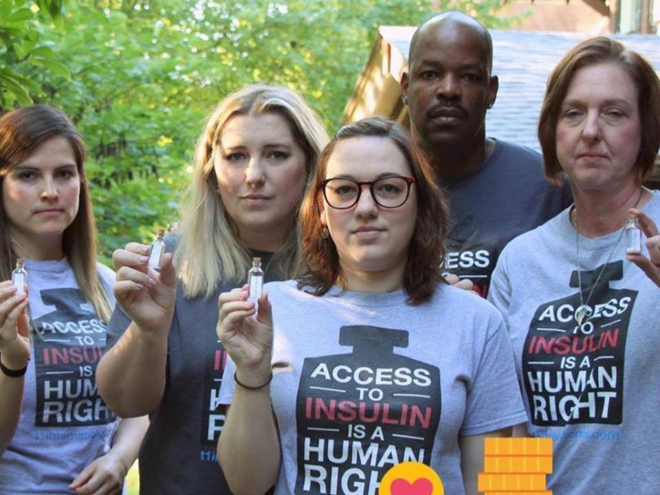 T1International activists including Nicole Smith-Holt, right, pose at an event) (Nicole Smith-Holt)