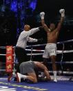 Britain Boxing - Anthony Joshua v Wladimir Klitschko IBF, IBO & WBA Super World Heavyweight Title's - Wembley Stadium, London, England - 29/4/17 Anthony Joshua knocks down Wladimir Klitschko Action Images via Reuters / Andrew Couldridge