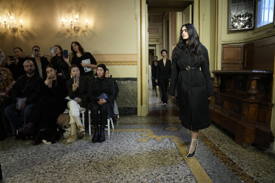 A model wears a creation as part of the Blumarine women's Fall-Winter 2024-25 collection presented in Milan, Italy, Friday, Feb. 23, 2024. (AP Photo/Antonio Calanni)