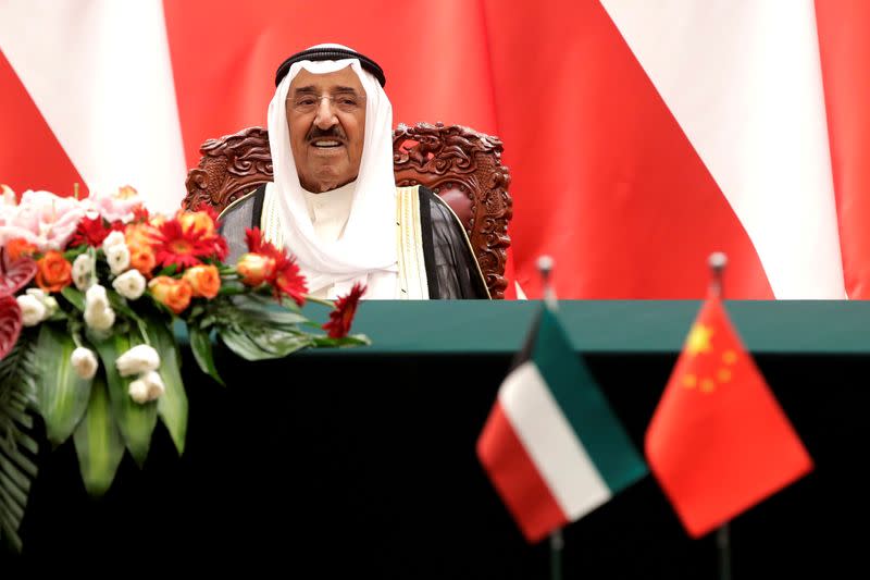 FILE PHOTO: Kuwait's Emir Sheikh Sabah Al-Ahmad Al- Jaber Al-Sabah looks as he witnesses a signing ceremony with Chinese President Xi Jinping at the Great Hall of the People in Beijing