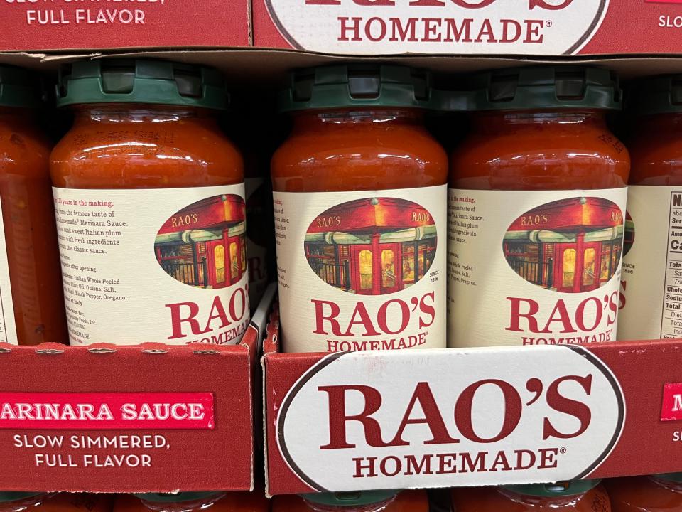 Cardboard display of large jars of Rao's sauce at a sam's club
