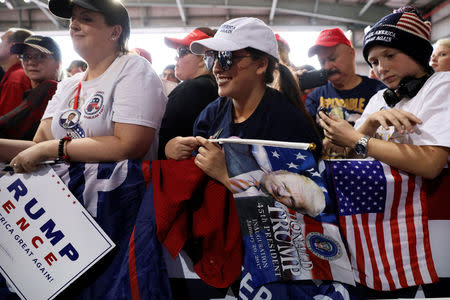 Supporters rally with U.S. President Donald Trump at Middle Georgia Regional Airport in Macon, Georgia, U.S. November 4, 2018. REUTERS/Jonathan Ernst