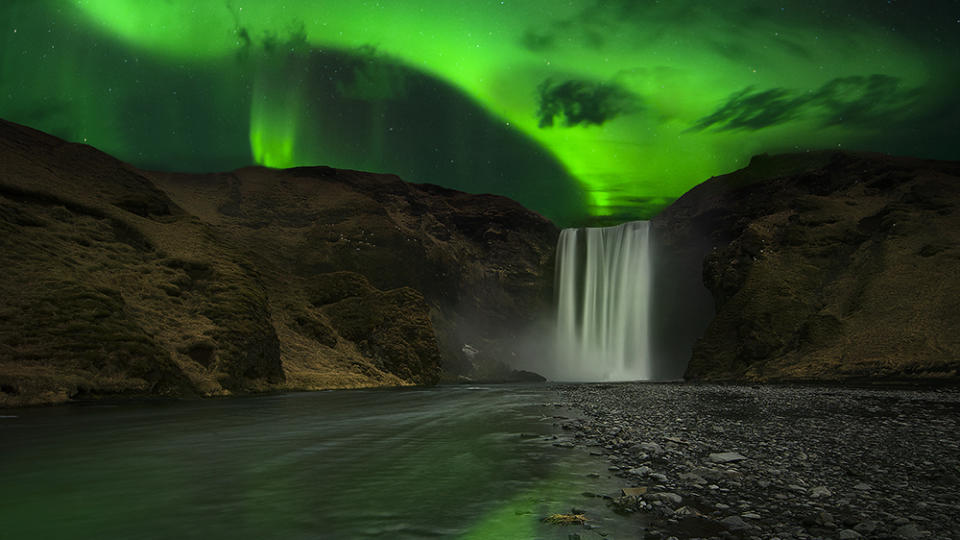 waterfall northern lights Iceland aurora borealis