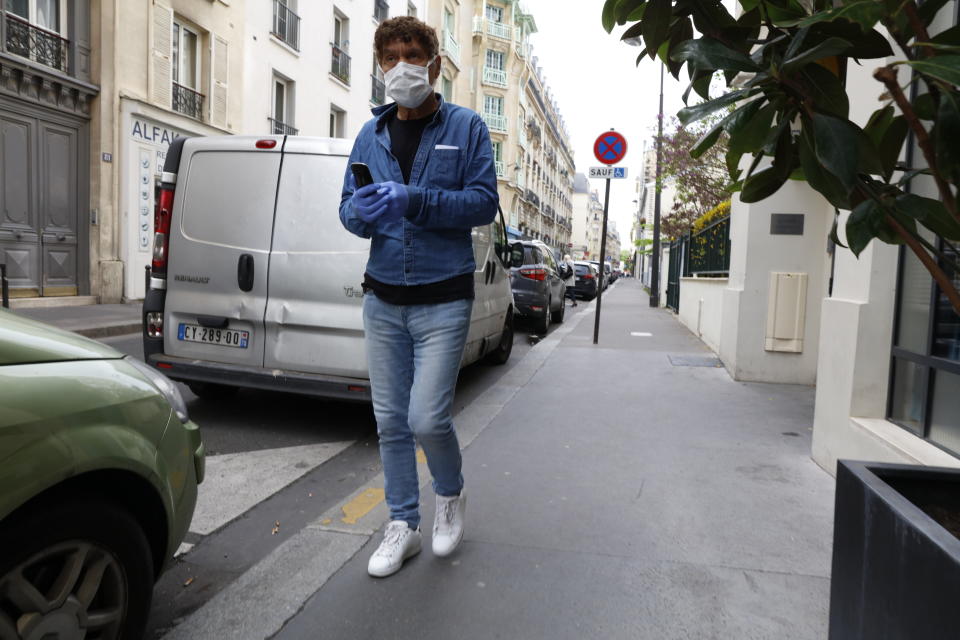 People shopping in Paris on April 7, 2020, during the lockdown in France to attempt to halt the spread of the novel coronavirus COVID-19.   (Photo by Mehdi Taamallah/NurPhoto via Getty Images)