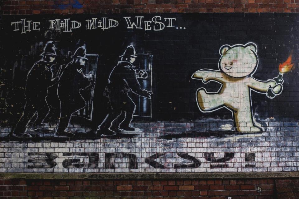 Banksy's first large stencil mural’ The Mild Mild West, in Stokes Croft, Bristol (Morgane Bigault)