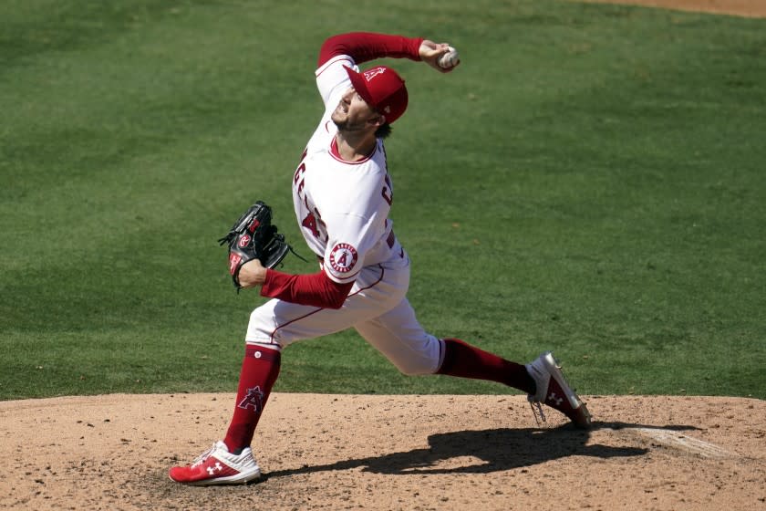 Los Angeles Angels starting pitcher Griffin Canning throws to the Arizona Diamondbacks.