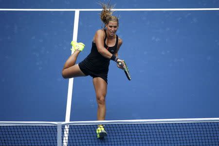 Dominika Cibulkova of Slovakia returns to Ana Ivanovic of Serbia during their match at the U.S. Open Championships tennis tournament in New York, August 31, 2015. REUTERS/Mike Segar