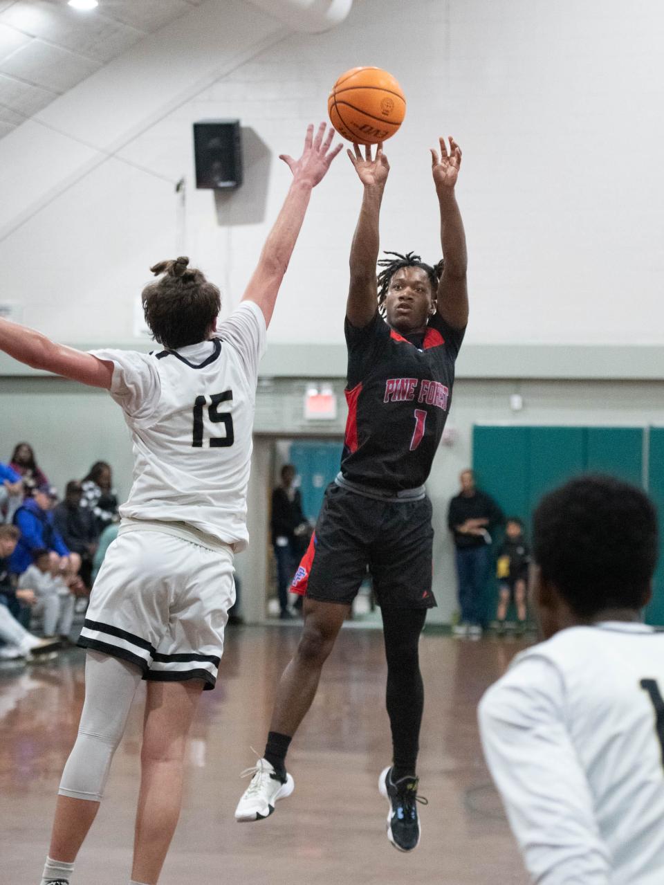 Maurice Smith (1) shoots during the Pine Forest vs Milton high school basketball game in the Esca-Rosa Challenge at Pensacola Catholic High School on Tuesday, Nov. 21, 2023.