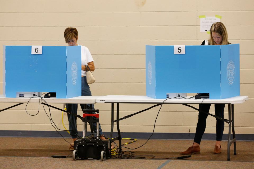 Locals vote at on Election Day in Athens on May 24, 2022.