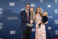 NASCAR Hall of Fame inductee Dale Earnhardt Jr., left, poses for photos prior to the induction ceremony on Friday, Jan. 21, 2022, in Charlotte, N.C. (AP Photo/Matt Kelley)