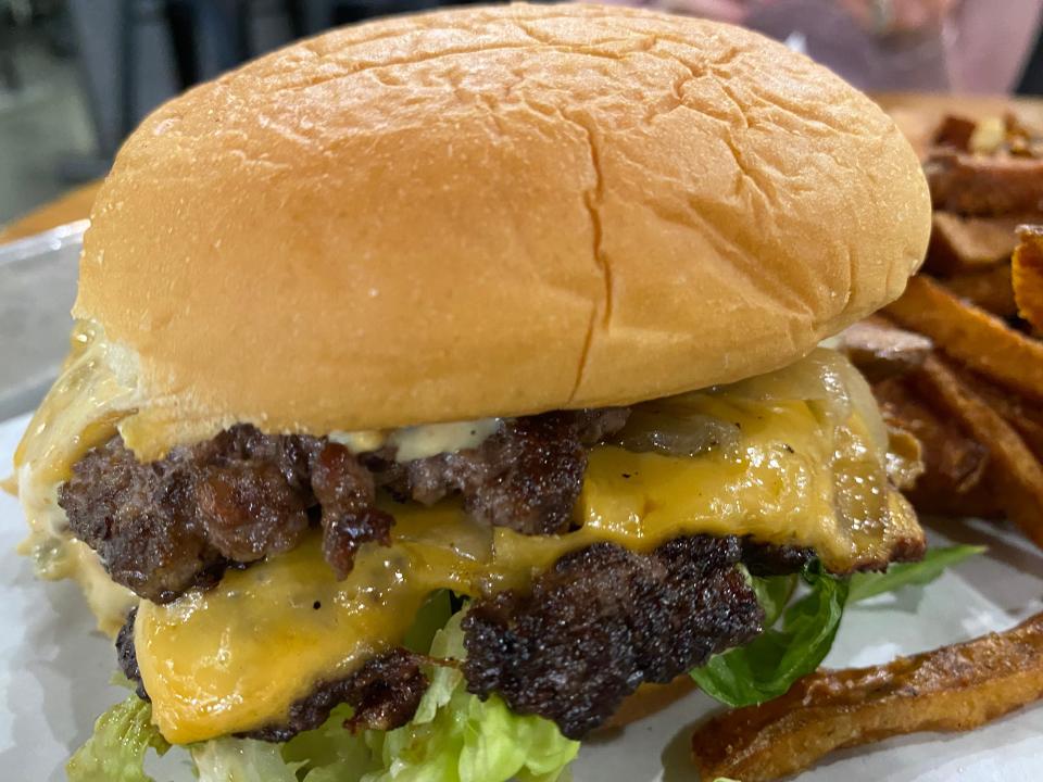 The double UnHitched Brewing Company's smashburger is served with fresh-cut fries.