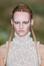 <p>Drama, drama and more drama. McQueen's metallic highlights and braided hair give an elven nod to the theme.</p>