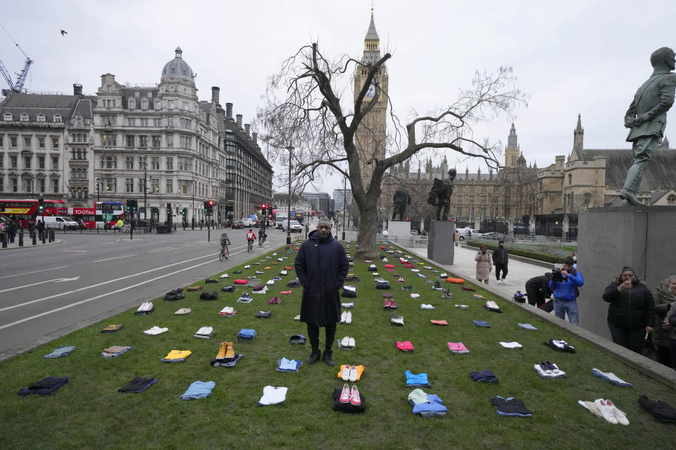FILE - British Actor Idris Elba stands in Parliament Square with clothing representing the human cost of UK knife crimes in London on Jan. 8, 2024, as he calls on the government to take immediate action. Knife crimes are on the rise in England and Wales, and a string of deadly attacks in recent years has stoked public anxiety and led to calls for the government to do more. (AP Photo/Frank Augstein)