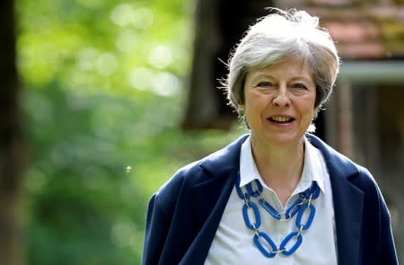 FILE PHOTO: British Prime Minister Theresa May leaves church services near High Wycombe, England