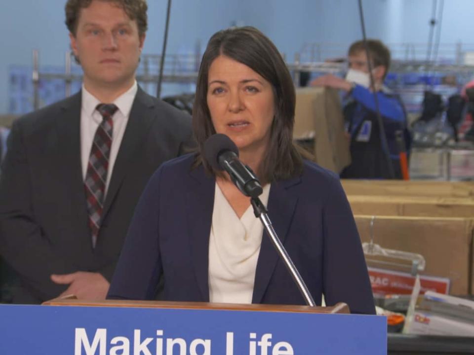 Premier Danielle Smith has backed away from one of her key promises — to amend the Alberta Human Rights Act to prevent employers from refusing to employ Albertans who aren't vaccinated against COVID-19.  (Dave Bajer/CBC  - image credit)