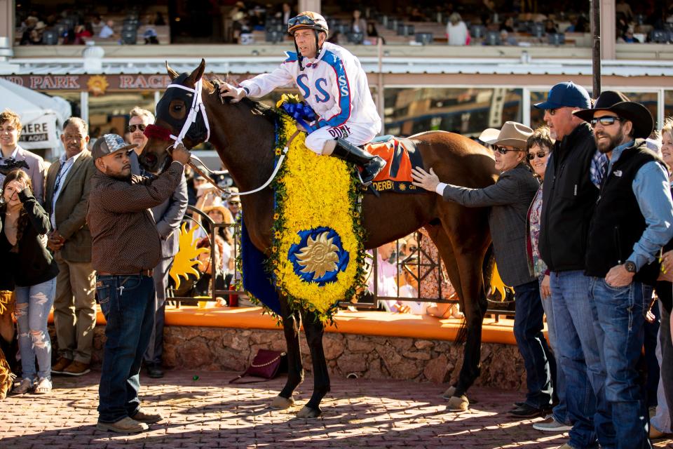 Jockey Ken S. Tohill atop “Wild on Ice”, #7, after winning the 18th running of the Sunland Derby at Sunland Park Racetrack & Casino in Sunland Park, New Mexico, Sunday, March 26, 2023.