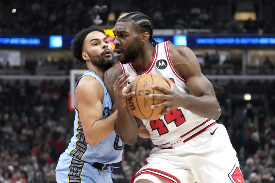 Chicago Bulls' Patrick Williams (44) drives to the basket as Memphis Grizzlies' Jacob Gilyard defends during the first half of an NBA basketball game Saturday, Jan. 20, 2024, in Chicago. (AP Photo/Charles Rex Arbogast)