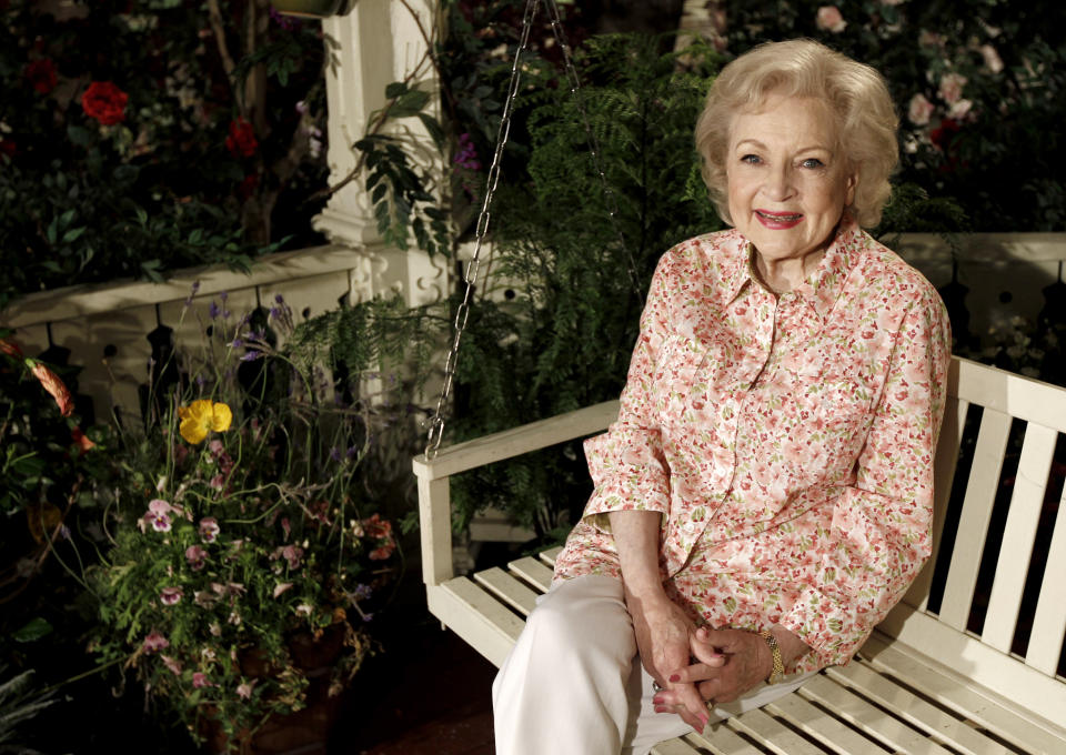 FILE - Actress Betty White poses for a portrait on the set of the television show "Hot in Cleveland" in Studio City section of Los Angeles on Wednesday, June 9, 2010. Betty White, whose saucy, up-for-anything charm made her a television mainstay for more than 60 years, has died. She was 99. (AP Photo/Matt Sayles, File)