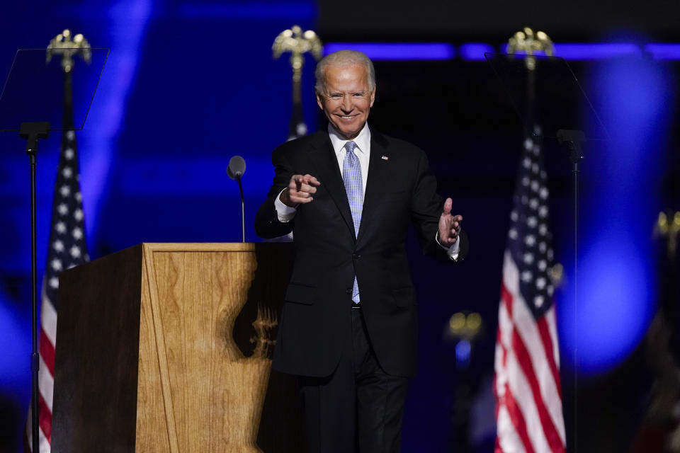 President-elect Joe Biden stands on stage after speaking Saturday, Nov. 7, 2020, in Wilmington, Del. (AP Photo/Andrew Harnik)