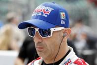 May 24, 2019; Indianapolis, IN, USA; The #14 car reflects in the sunglasses of IndyCar series driver Tony Kanaan on Carb Day for the 103rd Running of the Indianapolis 500 at Indianapolis Motor Speedway. Mandatory Credit: Brian Spurlock-USA TODAY Sports