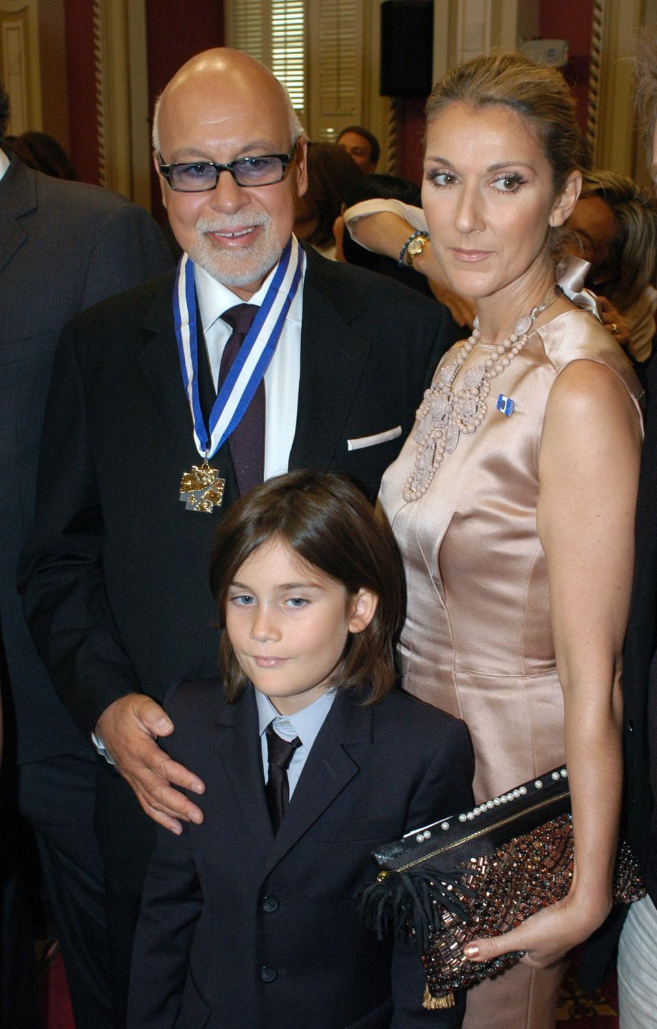 CANADA - JUNE 17:  Rene Angelil became an officer of the National Order in Quebec, Canada on June 17, 2009-Celine Dion and Rene-Charles. Prime minister of Quebec, Jean Charest, paid tribute to Rene Angelil, handing him the insignia of Officer of the Order National du Quebec, the most prestigious awards of the Quebec state.   (Photo by Jean-Philippe DUMAS/PONOPRESSE/Gamma-Rapho via Getty Images)