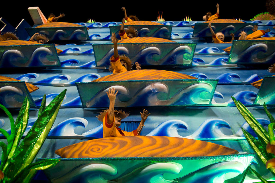 <p>Performers from the Portela samba school parade on a float during Carnival celebrations at the Sambadrome in Rio de Janeiro, Feb. 28, 2017. (AP Photo/Mauro Pimentel) </p>