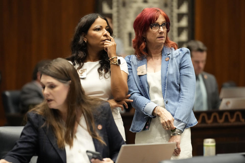 Arizona State Representatives Analise Ortiz, D, left, and Nancy Gutierrez, D, right, watch during debate at the Capitol, Tuesday, June 4, 2024, in Phoenix. (AP Photo/Matt York)