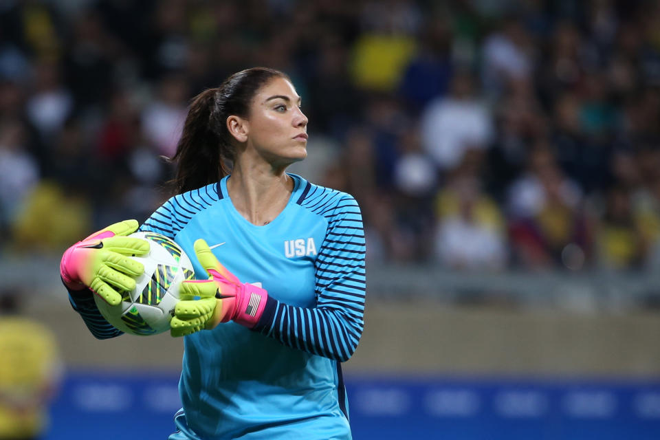 USWNT goalkeeper Hope Solo takes the ball during a match against New Zealand during the 2016 Olympics in Brazil.