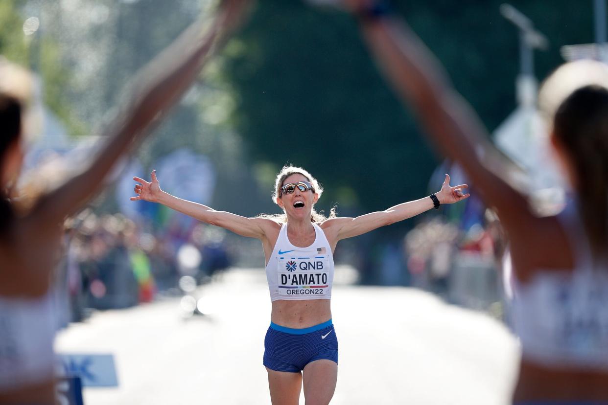 Keira D'Amato of Team United States reacts as she crosses the finish line of the Women's Marathon on day four of the World Athletics Championships Oregon22 at Hayward Field on July 18, 2022 in Eugene, Oregon.