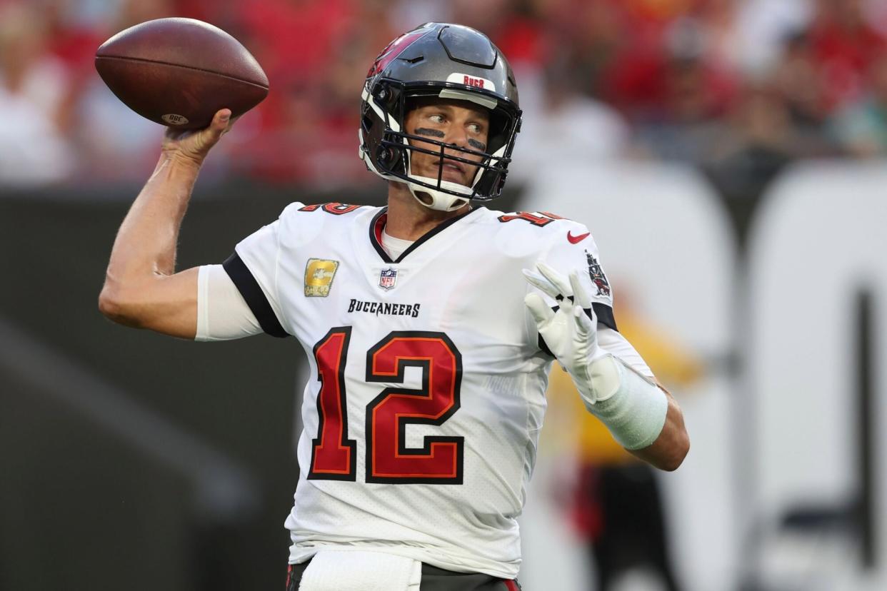 Mandatory Credit: Photo by Mark LoMoglio/AP/Shutterstock (13611332ag) Tampa Bay Buccaneers quarterback Tom Brady reaches back to pass during the first half of an NFL football game between the Los Angeles Rams and Tampa Bay Buccaneers, in Tampa, Fla Rams Buccaneers Football, Tampa, United States - 06 Nov 2022