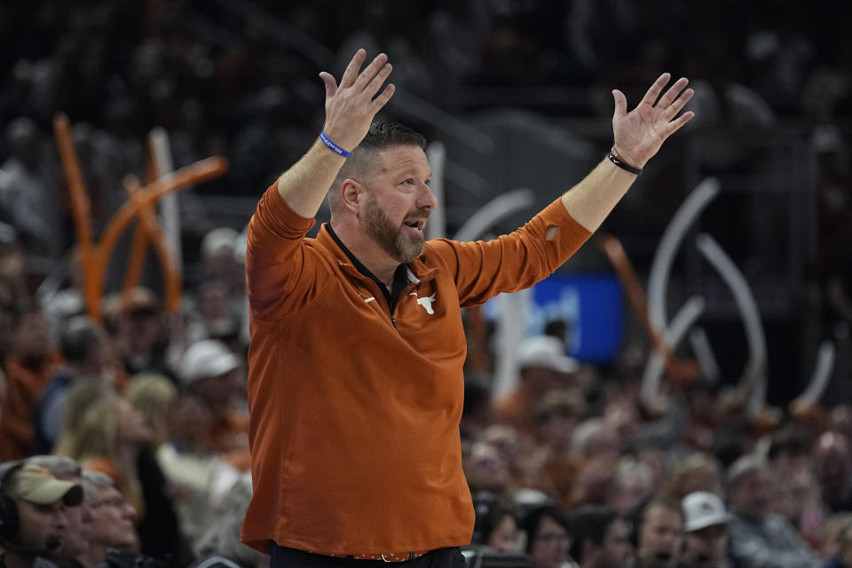 Texas head coach Chris Beard signals to his players during the first half of an NCAA college basketball game against Gonzaga, Wednesday, Nov. 16, 2022, in Austin, Texas. (AP Photo/Eric Gay)